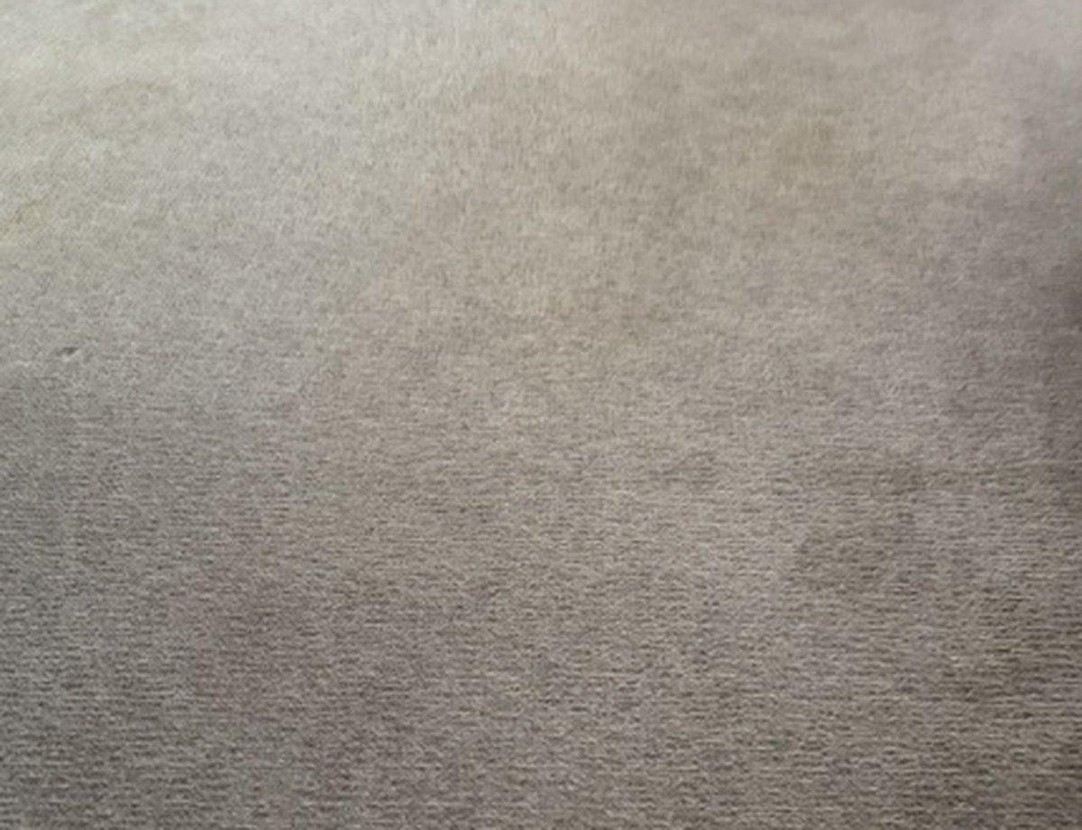 After carpet stretching showing a smooth carpet surface